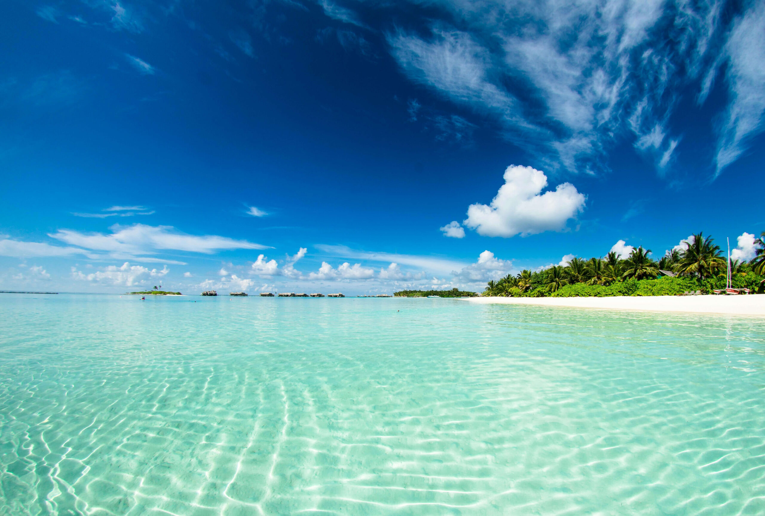 Clear ocean and beach with blue skies